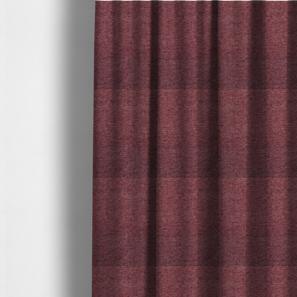 The fabric used to create these made-to-measure curtains is a rich burgundy red woven fabric with a fine, heathered texture.