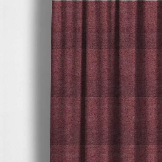 The fabric used to create these made-to-measure curtains is a rich burgundy red woven fabric with a fine, heathered texture.