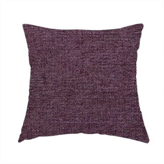 The fabric used to create this handmade cushion is a rich plum purple woven fabric with a fine, heathered texture.