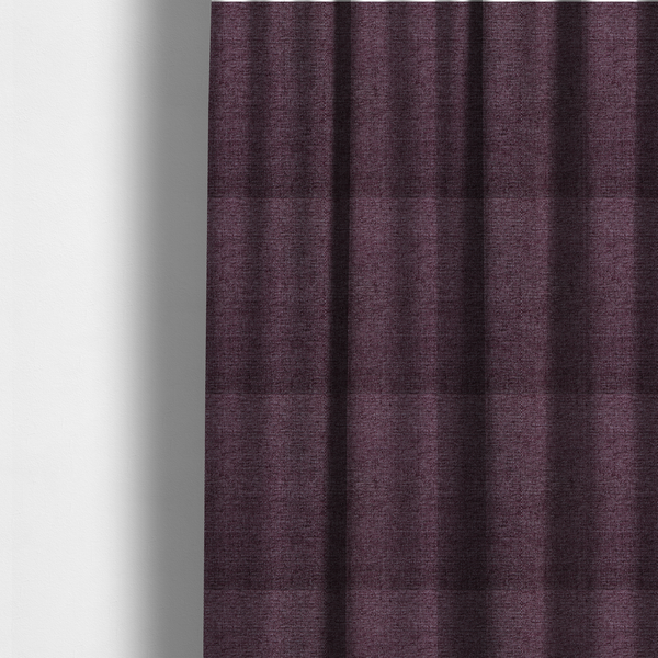 The fabric used to create these made-to-measure curtains is a rich plum purple woven fabric with a fine, heathered texture.