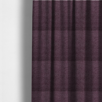 The fabric used to create these made-to-measure curtains is a rich plum purple woven fabric with a fine, heathered texture.