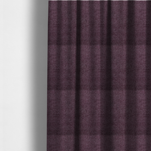 The fabric used to create these made-to-measure curtains is a rich plum purple woven fabric with a fine, heathered texture.