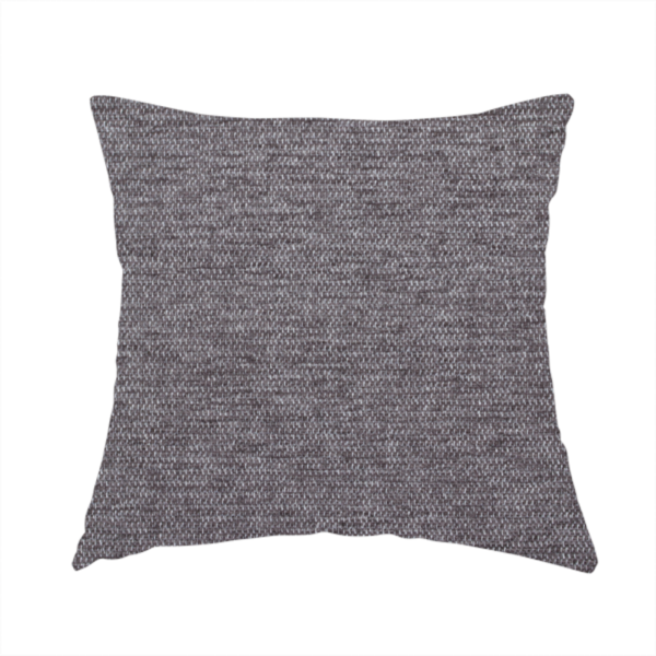 The fabric used to create this handmade cushion is a charcoal grey woven fabric with a fine, heathered texture.