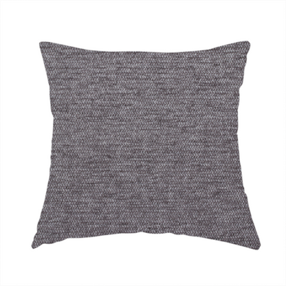 The fabric used to create this handmade cushion is a charcoal grey woven fabric with a fine, heathered texture.