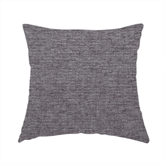 The fabric used to create this handmade cushion is a charcoal grey woven fabric with a fine, heathered texture.