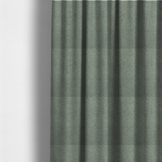The fabric used to create these made-to-measure curtains is a sage green woven fabric with a fine, heathered texture.