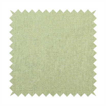 A light lime green woven fabric with a fine, heathered texture.
