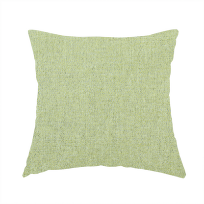 The fabric used to create this handmade cushion is a  light lime green woven fabric with a fine, heathered texture.