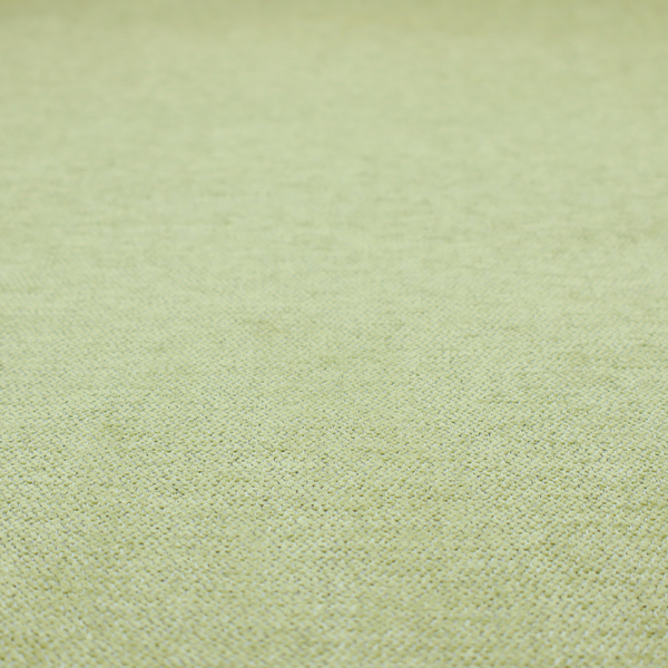 A light lime green woven fabric with a fine, heathered texture.