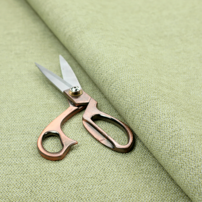 A light lime green woven fabric with a fine, heathered texture.