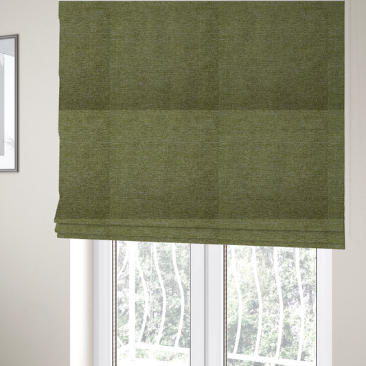 The fabric used to create these Roman blinds is a rich olive green woven fabric with a fine, heathered texture.
