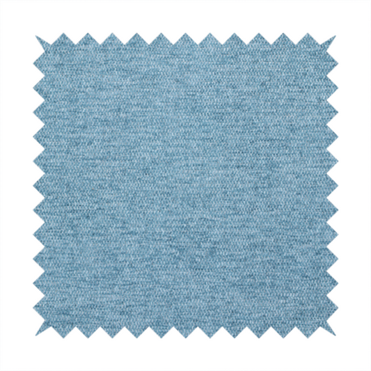 A soft blue woven fabric with a fine, heathered texture.