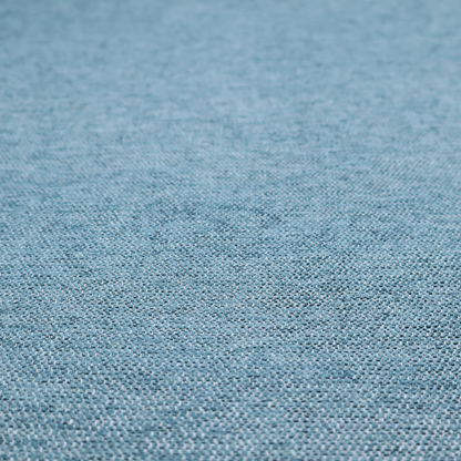 A soft blue woven fabric with a fine, heathered texture.