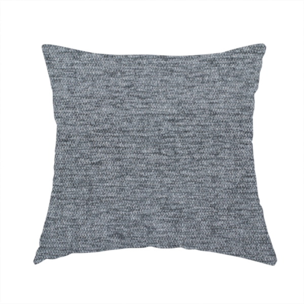 The fabric used to create this handmade cushion is a charcoal grey woven fabric with a fine, heathered texture.