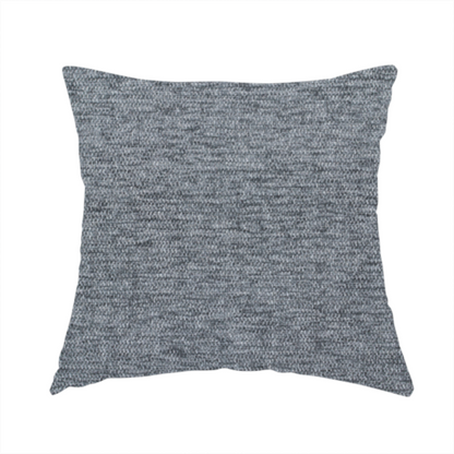 The fabric used to create this handmade cushion is a charcoal grey woven fabric with a fine, heathered texture.