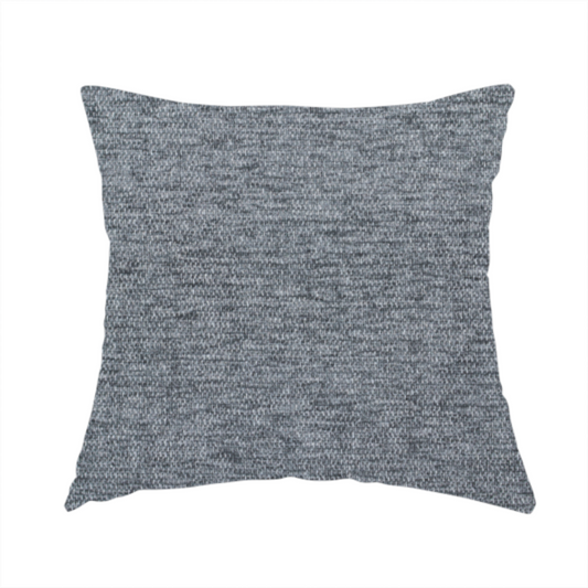 The fabric used to create this handmade cushion is a charcoal grey woven fabric with a fine, heathered texture.