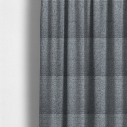 The fabric used to create these made-to-measure curtains is a silver-grey woven fabric with a fine, heathered texture.
