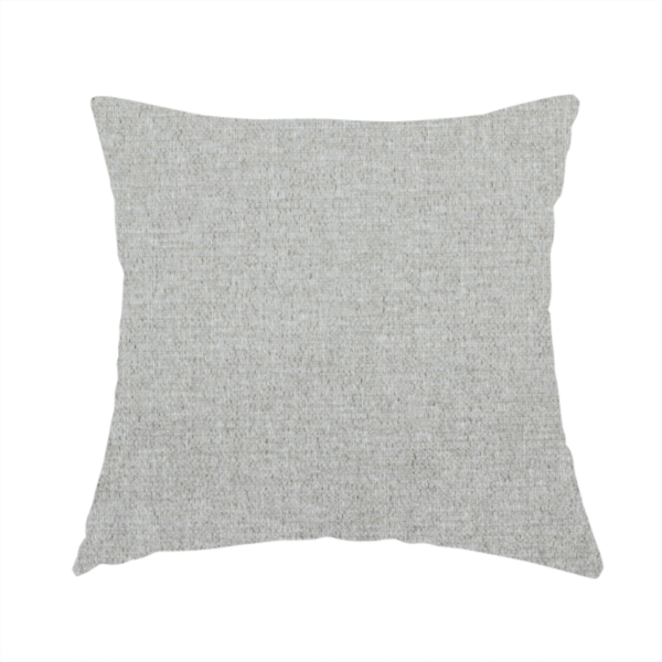 The fabric used to create this handmade cushion is a light silver-grey woven fabric with a fine, heathered texture.