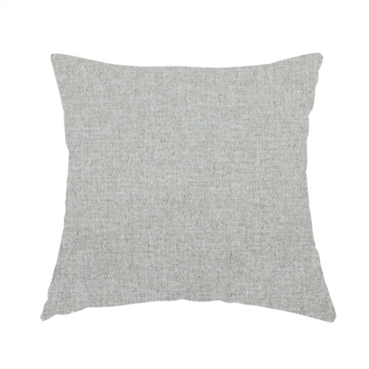 The fabric used to create this handmade cushion is a light silver-grey woven fabric with a fine, heathered texture.