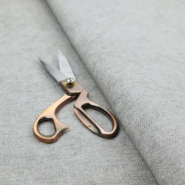 A light silver-grey woven fabric with a fine, heathered texture.