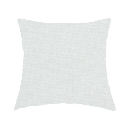 The fabric used to create this handmade cushion is a solid, off-white or light cream-coloured woven fabric. The weave appears consistent and fine, creating a subtle, clean aesthetic.
