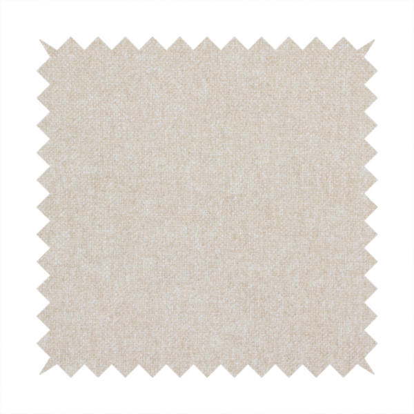 A woven upholstery fabric in a warm, light beige or sand colour, featuring a consistent, textured surface pattern.