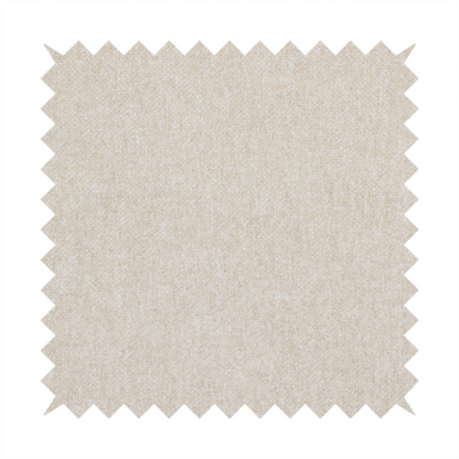 A woven upholstery fabric in a warm, light beige or sand colour, featuring a consistent, textured surface pattern.