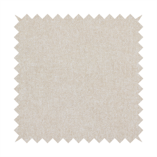 A woven upholstery fabric in a warm, light beige or sand colour, featuring a consistent, textured surface pattern.