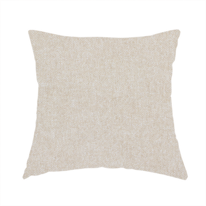 The fabric used to create this handmade cushion is a woven upholstery fabric in a warm, light beige or sand colour, featuring a consistent, textured surface pattern.