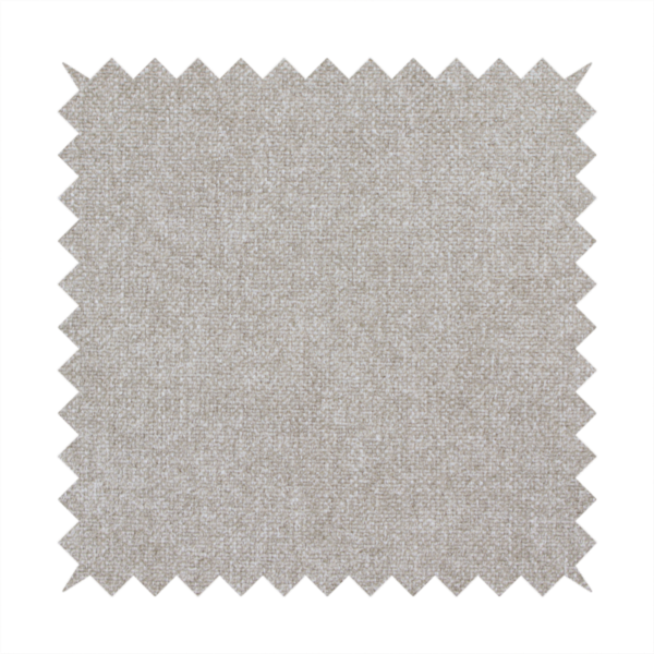 A woven upholstery fabric in a neutral, soft grey tone, featuring a consistent and textured surface pattern.