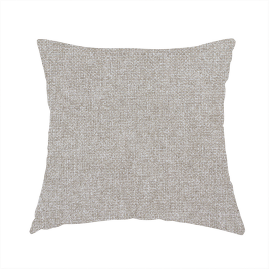 The fabric used to create this handmade cushion is a woven upholstery fabric in a neutral, soft grey tone, featuring a consistent and textured surface pattern.