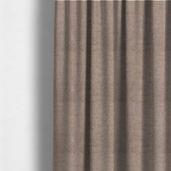 The fabric used to create these made-to-measure curtains is a fine, woven upholstery fabric in a rich, warm taupe or brown tone, featuring a consistent and textured surface pattern.