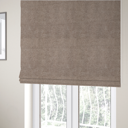 The fabric used to create these Roman blinds is a fine, woven upholstery fabric in a rich, warm taupe or brown tone, featuring a consistent and textured surface pattern.
