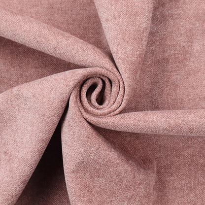 A fine, woven upholstery fabric in a soft, muted dusty pink tone, featuring a consistent and textured surface pattern.