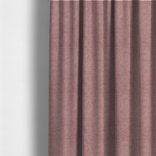 The fabric used to create these made-to-measure curtains is a fine, woven upholstery fabric in a deep, muted mauve or dusky rose tone, featuring a consistent and textured surface pattern.