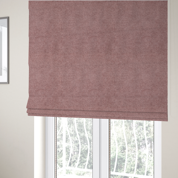 The fabric used to create these Roman blinds is a fine, woven upholstery fabric in a deep, muted mauve or dusky rose tone, featuring a consistent and textured surface pattern.