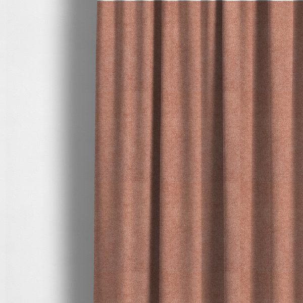 The fabric used to create these made-to-measure curtains is a fine, woven upholstery fabric in a warm, muted terracotta or copper tone, featuring a consistent and textured surface pattern.
