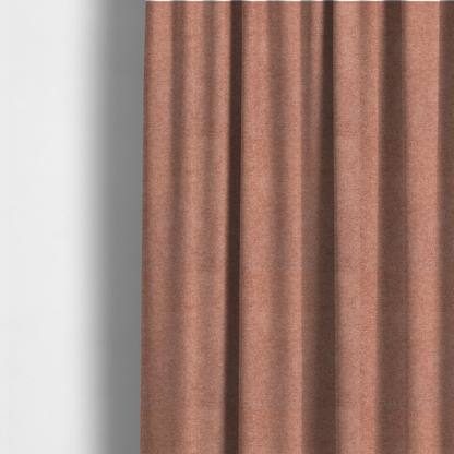 The fabric used to create these made-to-measure curtains is a fine, woven upholstery fabric in a warm, muted terracotta or copper tone, featuring a consistent and textured surface pattern.