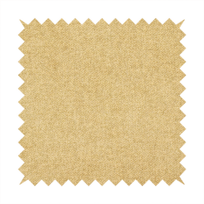 a fine, woven upholstery fabric in a warm, golden yellow or ochre tone, featuring a consistent and textured surface pattern.