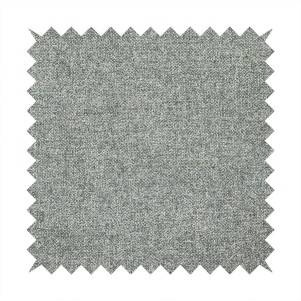 A fine, woven upholstery fabric in a cool, sophisticated slate grey tone, featuring a consistent and textured surface pattern.