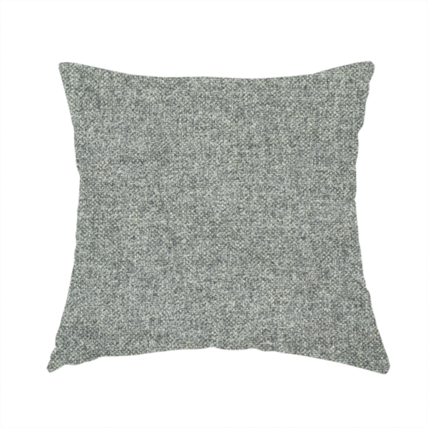 The fabric used to create this handmade cushion is a fine, woven upholstery fabric in a cool, sophisticated slate grey tone, featuring a consistent and textured surface pattern.