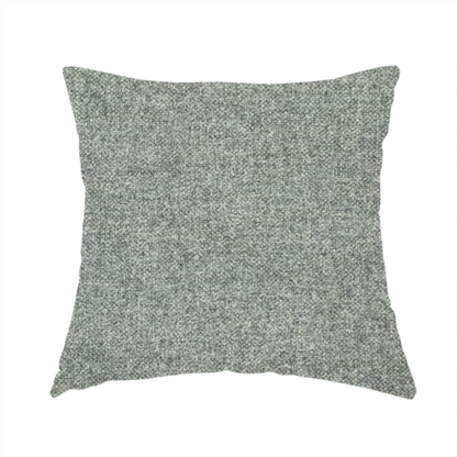 The fabric used to create this handmade cushion is a fine, woven upholstery fabric in a cool, sophisticated slate grey tone, featuring a consistent and textured surface pattern.