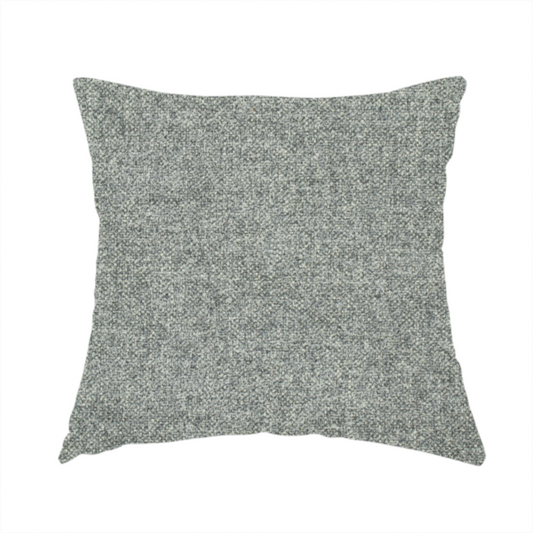 The fabric used to create this handmade cushion is a fine, woven upholstery fabric in a cool, sophisticated slate grey tone, featuring a consistent and textured surface pattern.