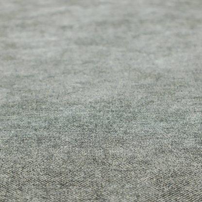 A fine, woven upholstery fabric in a cool, sophisticated slate grey tone, featuring a consistent and textured surface pattern.