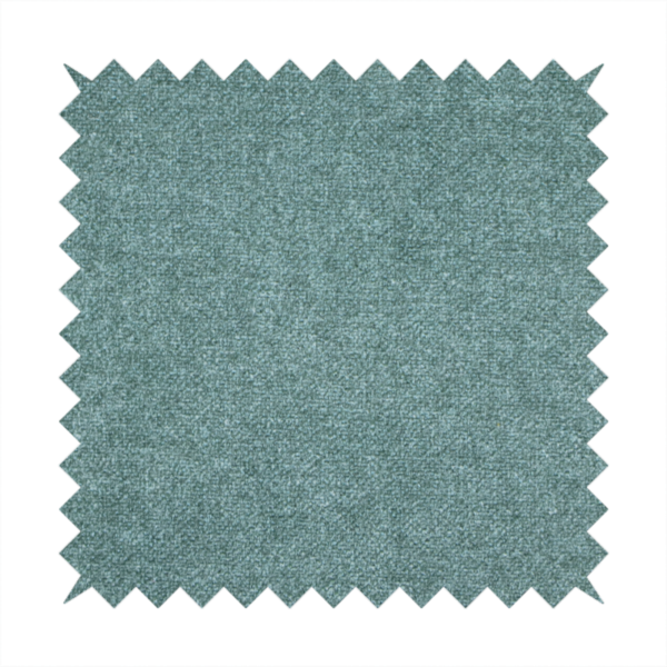 A fine, woven upholstery fabric in a rich, calming teal or muted blue-green tone, featuring a consistent and textured surface pattern.