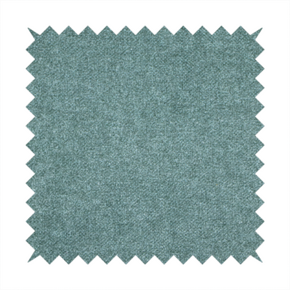A fine, woven upholstery fabric in a rich, calming teal or muted blue-green tone, featuring a consistent and textured surface pattern.