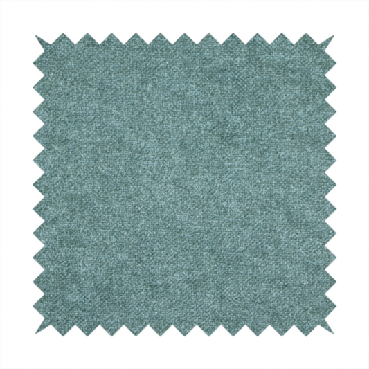 A fine, woven upholstery fabric in a rich, calming teal or muted blue-green tone, featuring a consistent and textured surface pattern.