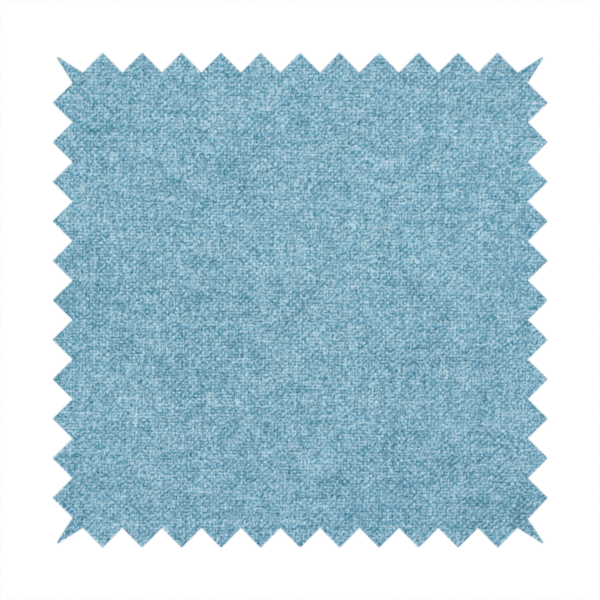 A fine, woven upholstery fabric in a bright, refreshing sky blue tone, featuring a consistent and textured surface pattern.