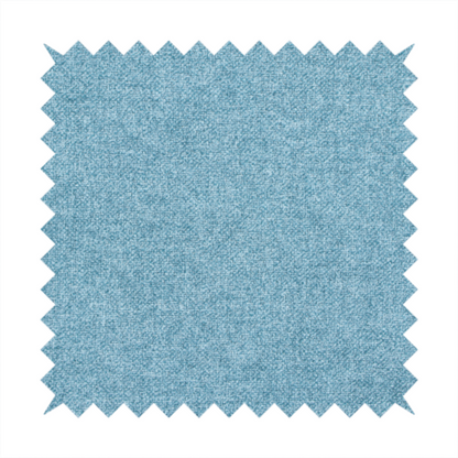 A fine, woven upholstery fabric in a bright, refreshing sky blue tone, featuring a consistent and textured surface pattern.