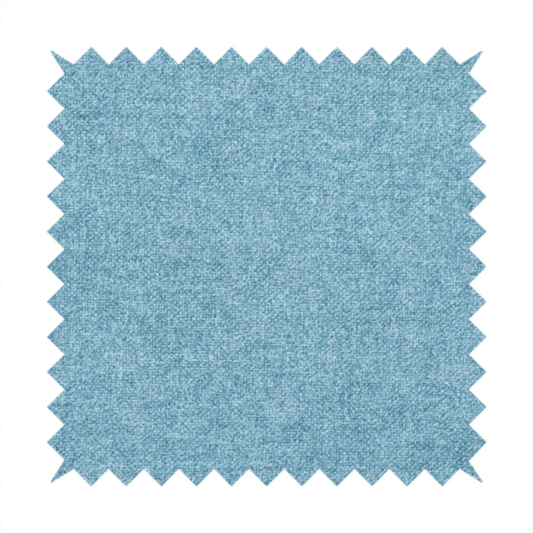 A fine, woven upholstery fabric in a bright, refreshing sky blue tone, featuring a consistent and textured surface pattern.